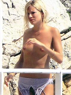 Blonde Sienna Miller topless paparazzi photo