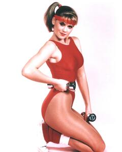 Kristy Swanson sexy in red swimsuit