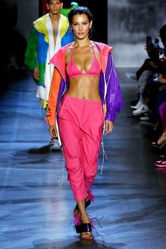 Bella Hadid cleavage in pink bikini bra at Prabal Gurung Fashion Show