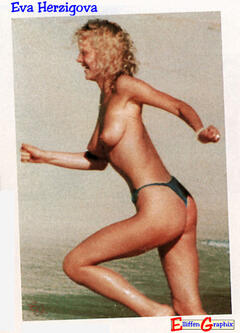 Eva Herzigova topless on a beach