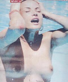 Sophie Anderton topless poolside