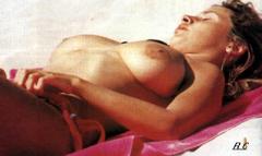 Busty italian Deborah Caprioglio sunabting topless