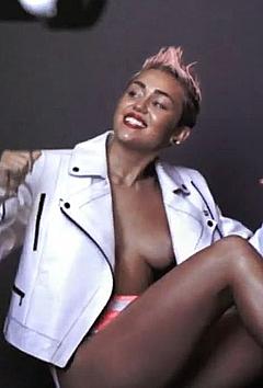 Miley Cyrus braless for V Magazine