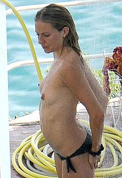 Actress Sienna Miller topless under shower