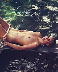 Laeticia Hallyday lying naked