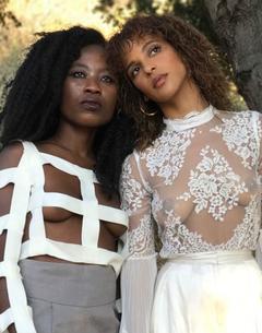 Megalyn Echikunwoke posing in see through top