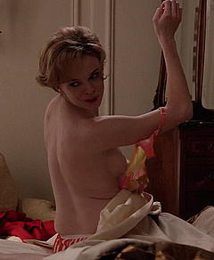 Danielle Panabaker side of nude boob in Mad Men
