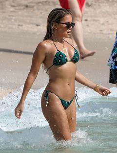 Sylvie Meis in green bikini on the beach in Saint-Barthelemy