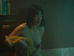 Dorcas Coppin flashing her nude boob at Comme mon fils