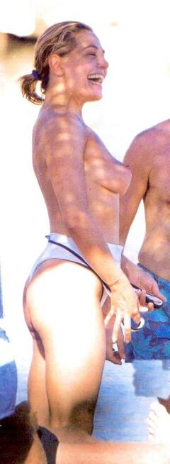 Barbara d'Urso topless on a beach paparazzi photo