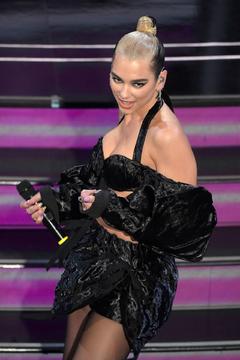 Dua Lipa sexy performing at 70th San Remo Italian Music Festival