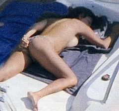 Sabrina Ferilli sunbathing naked on a yacht