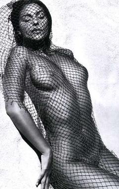 Monica Bellucci nude under fishnet