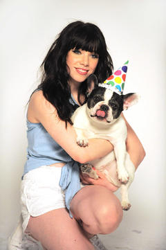 Carly Rae Jepsen posing with doggy