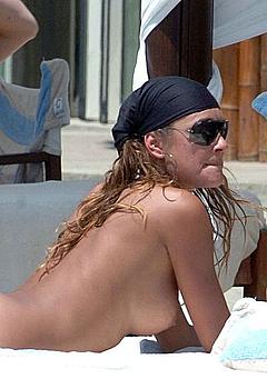 Alena Seredova sunbathing topless