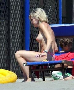 Brigitta Boccoli topless on a beach paparazzi photo