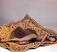 Naomi Campbell lying naked