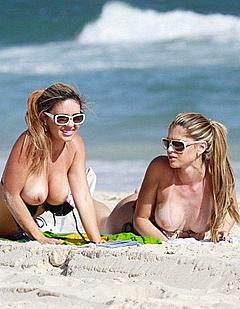 Brazilian models Fernanda Araldi and Larissa Gomes sunbathing topless in Barra da Tijuca