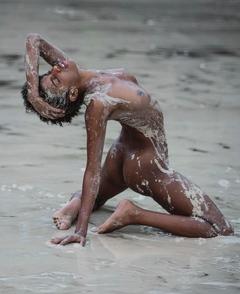 Ebonee Davis fully nude on a beach