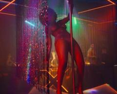 Yakelina Sinisterra dancing topless at Murder City