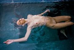 Bailee Mykell fully nude in a pool