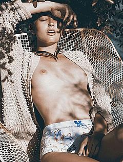 Heather Depriest lying topless