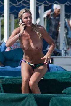 Patrizia Roversi topless on a beach paparazzi photo