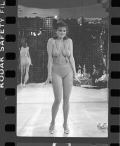 Serena Grandi flashing her boobs