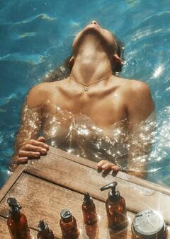 Olivia Wilde topless in a water