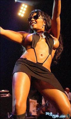 Lil Kim boob slip on a stage paparazzi photo