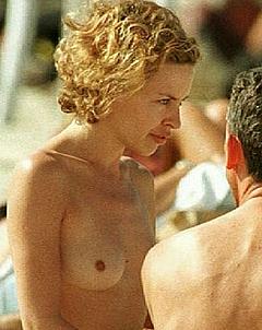 Kylie Minogue topless on a beach paparazzi photo