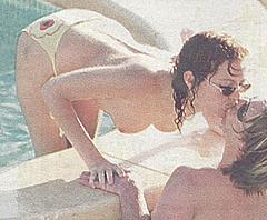 Tracy Shaw topless at a pool