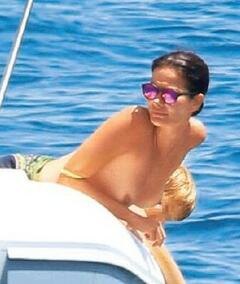 Ilaria Spada topless on a boat paparazzi photo