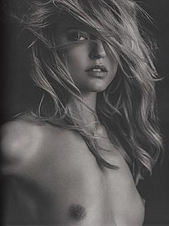 Blonde Martha Hunt topless