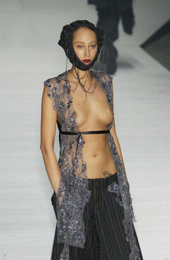 Talytha Pugliesi walks runway topless