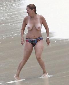 Marilyn Milian nude boobs on a beach