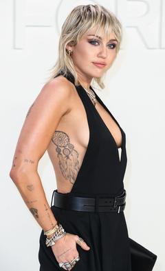 Pop singer Miley Cyrus sexy at Tom Ford Fashion Show in Hollywood