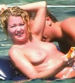 Angela Melillo topless on a beach paparazzi photo