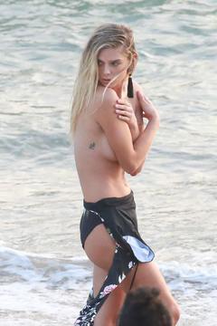 Danielle Knudson topless cover her boobs