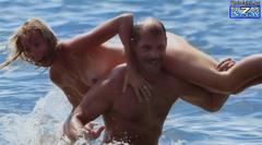 Silvia Rocca topless in a water with honey paparazzi photo