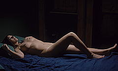 Monica Bellucci lying fully nude in A Burning Hot Summer