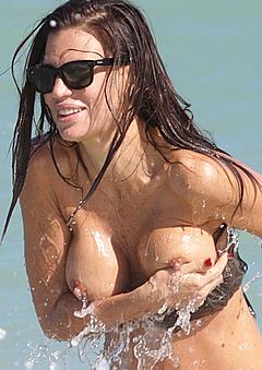 Claudia Galanti lost her bikini bra shows nude boobs