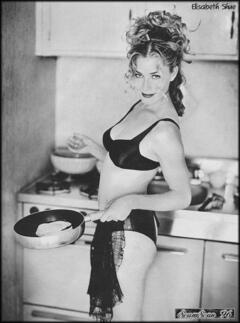 Elisabeth Shue sexy in a kitchen