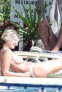 Lisa Faulkner sunbathing topless poolside