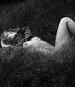 Doutzen Kroes lying nude in nature