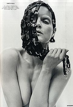 Guinevere van Seenus topless but covered