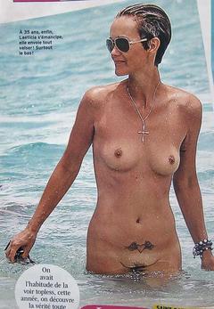 Laeticia Hallyday nude in a water