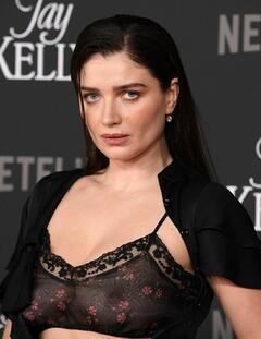 Eve Hewson in see through bra at Jay Kelly premiere