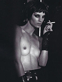 Iris Strubegger smoking topless