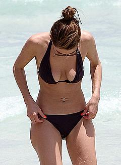 Maria Menounos cleavage in black bikini